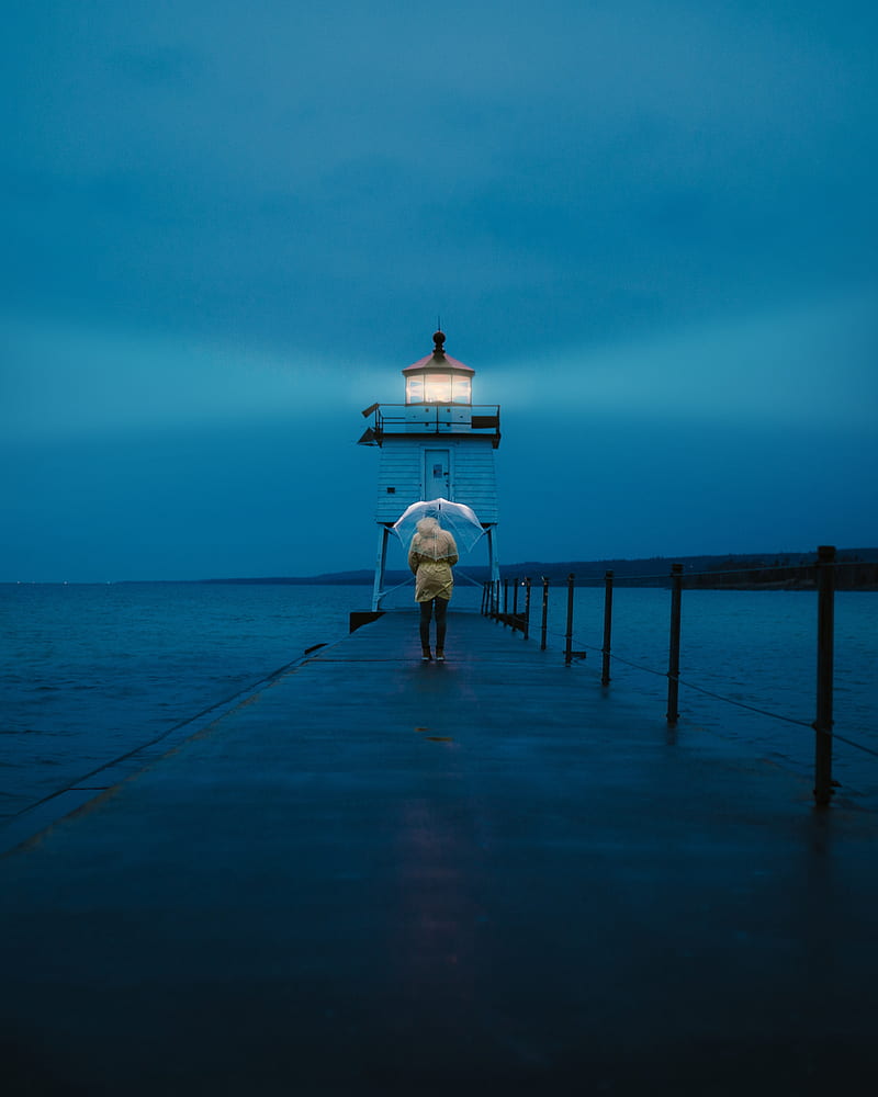 pier, man, lighthouse, umbrella, sea, twilight, HD phone wallpaper
