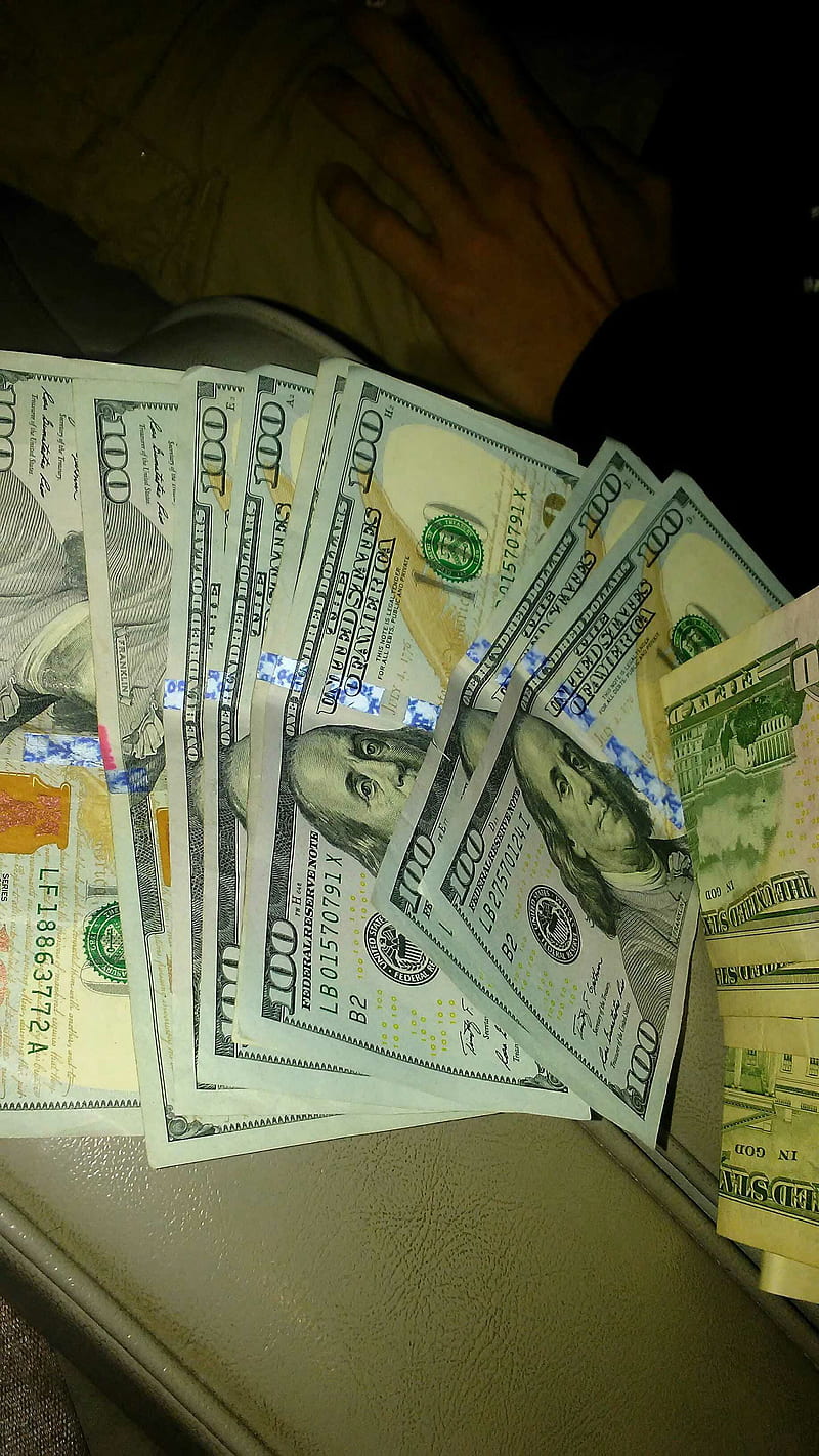 Real Stacks of Money on Bed 