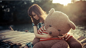sad girl with teddy bear wallpaper