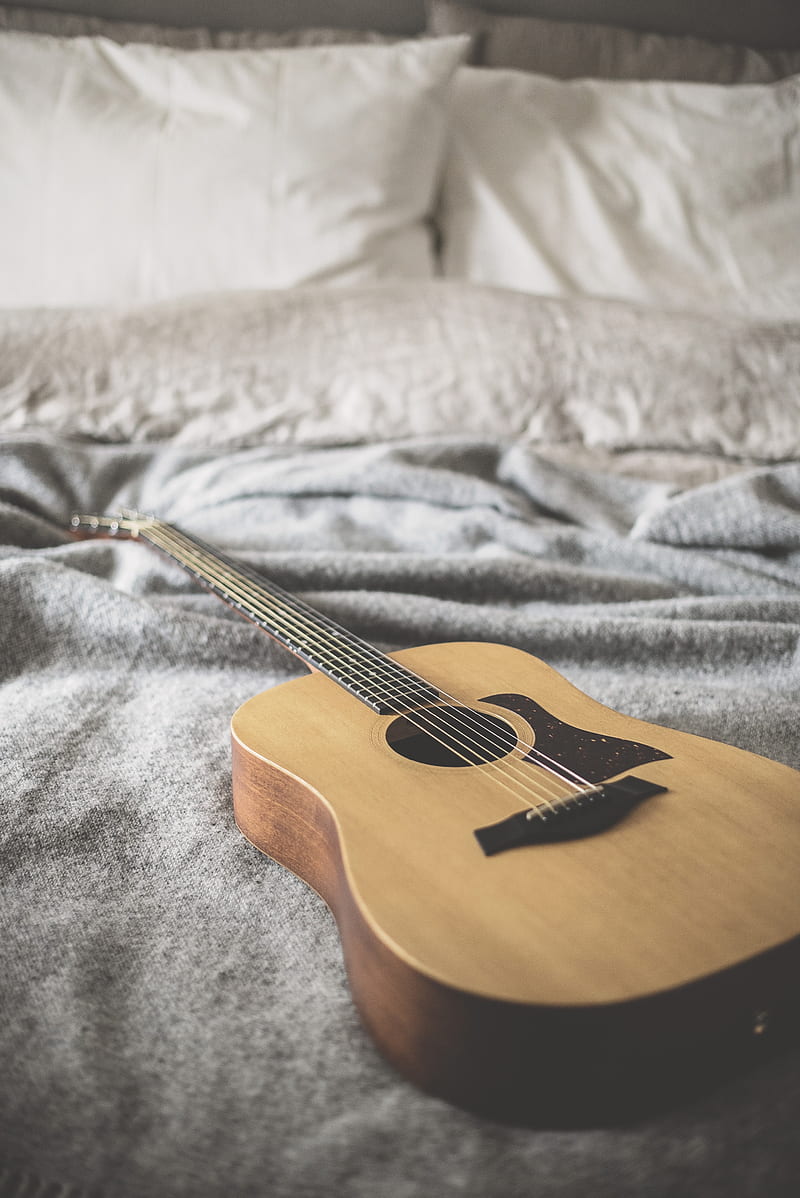 brown acoustic guitar on gray blanket, HD phone wallpaper