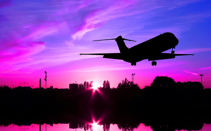 pretty sunset sky with plane