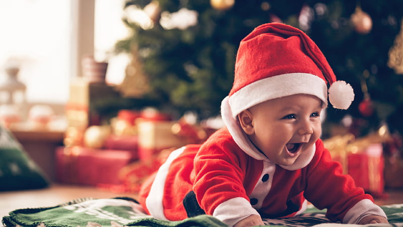 Cute Baby is Wearing Santa Outfit Lying Down On Mat In A Blur Background Cute, HD wallpaper