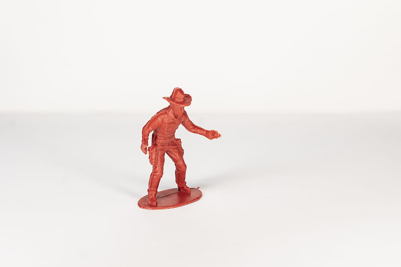 red plastic toy on white surface, HD wallpaper