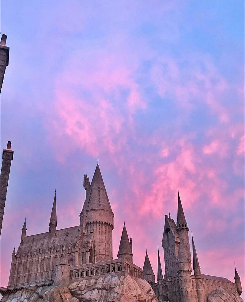 Sunset at Hogwarts, castle, colorful, harry potter hogwarts, pink, purple, sunset, HD phone wallpaper