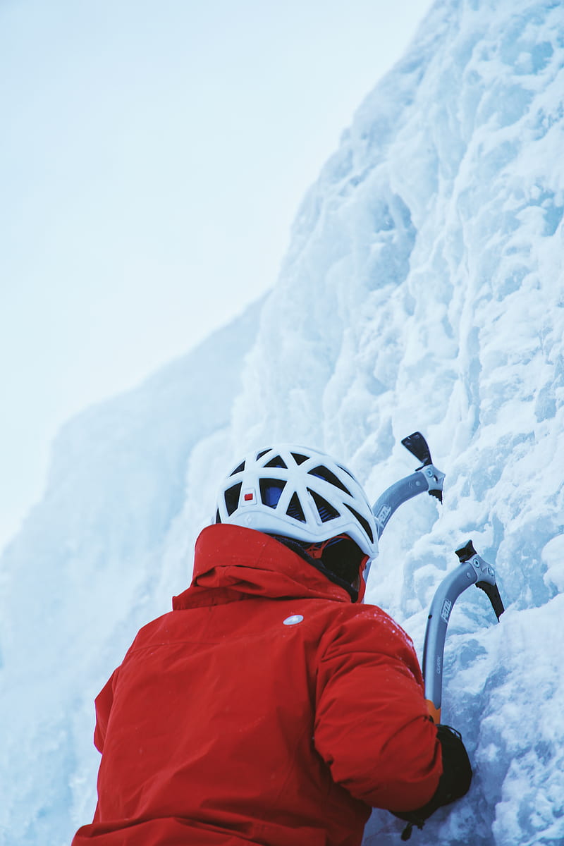 person in red jacket while climbing ice wall at daytime, HD phone wallpaper