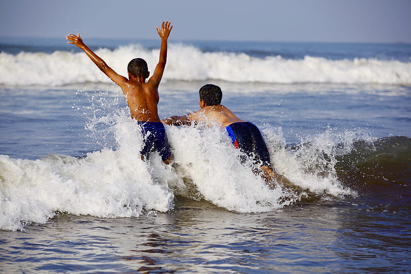 two boys playing with the waves, HD wallpaper