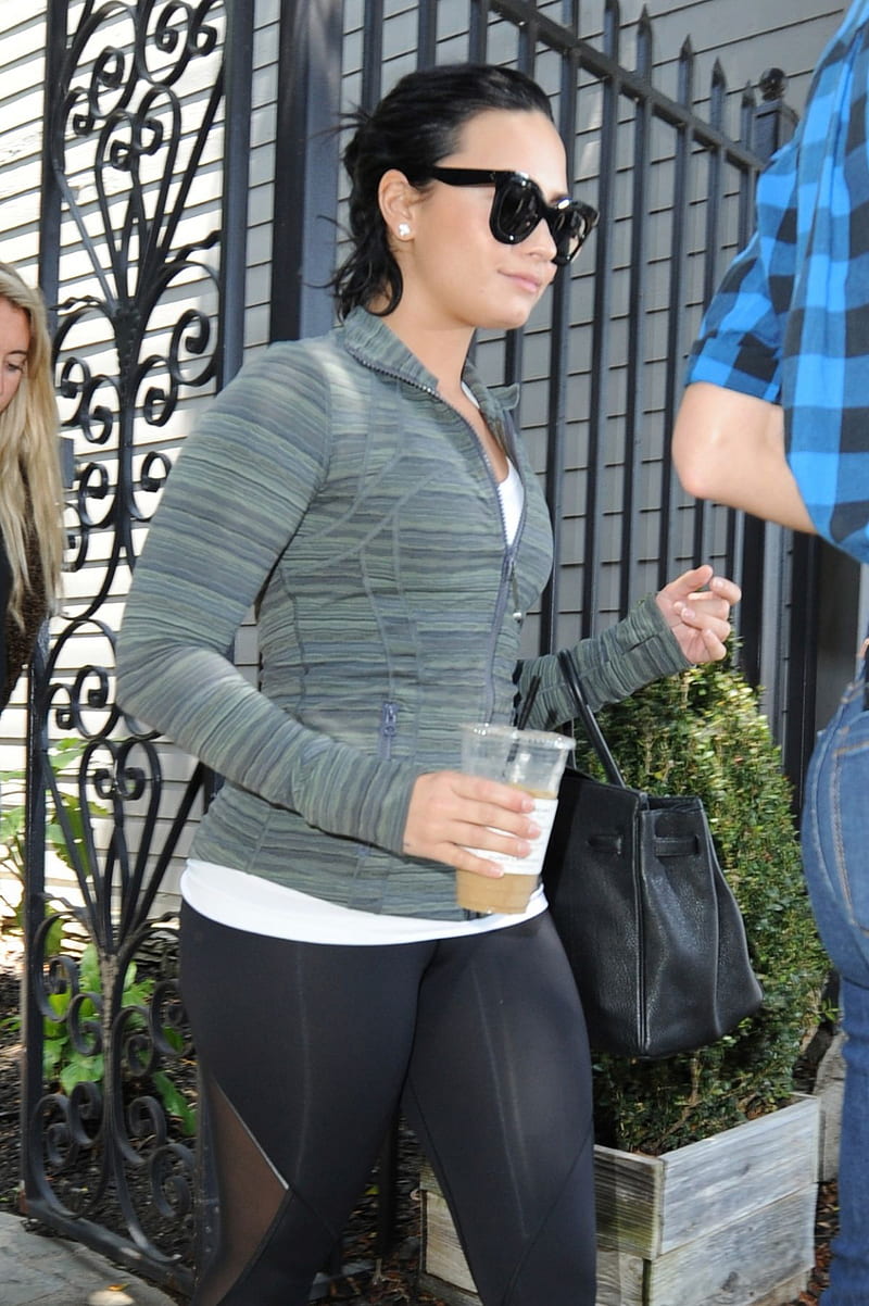 Demi Lovato spotted in a dark grey tee and black leggings as she