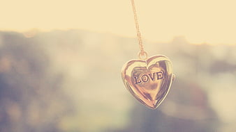 Love Word Heart Gold Chain Pendant In Blur Background Heart, HD wallpaper |  Peakpx