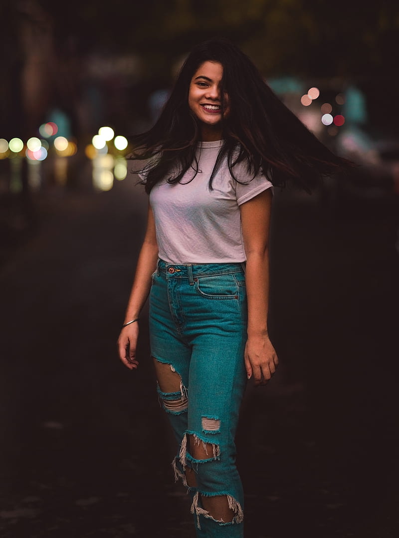 woman in white crew-neck T-shirt and distressed teal jeans waving hair, HD phone wallpaper