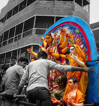 Image of Goddess Durga idol at decorated Durga Puja pandal, shot at colored  light, in Kolkata, West Bengal, India. Durga Puja is biggest religious  festival of Hinduism and is now celebrated worldwide.-AY108756-Picxy