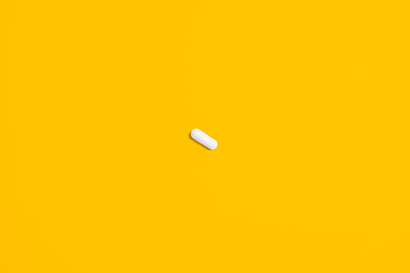 White Pill on Yellow Surface, HD wallpaper