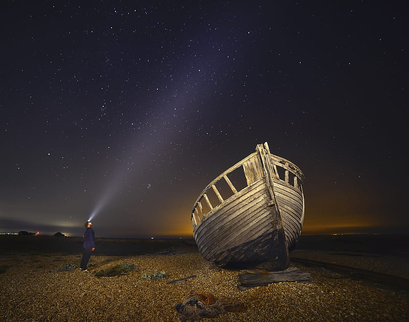 man standing beside brown wooden boat under starry night, HD wallpaper