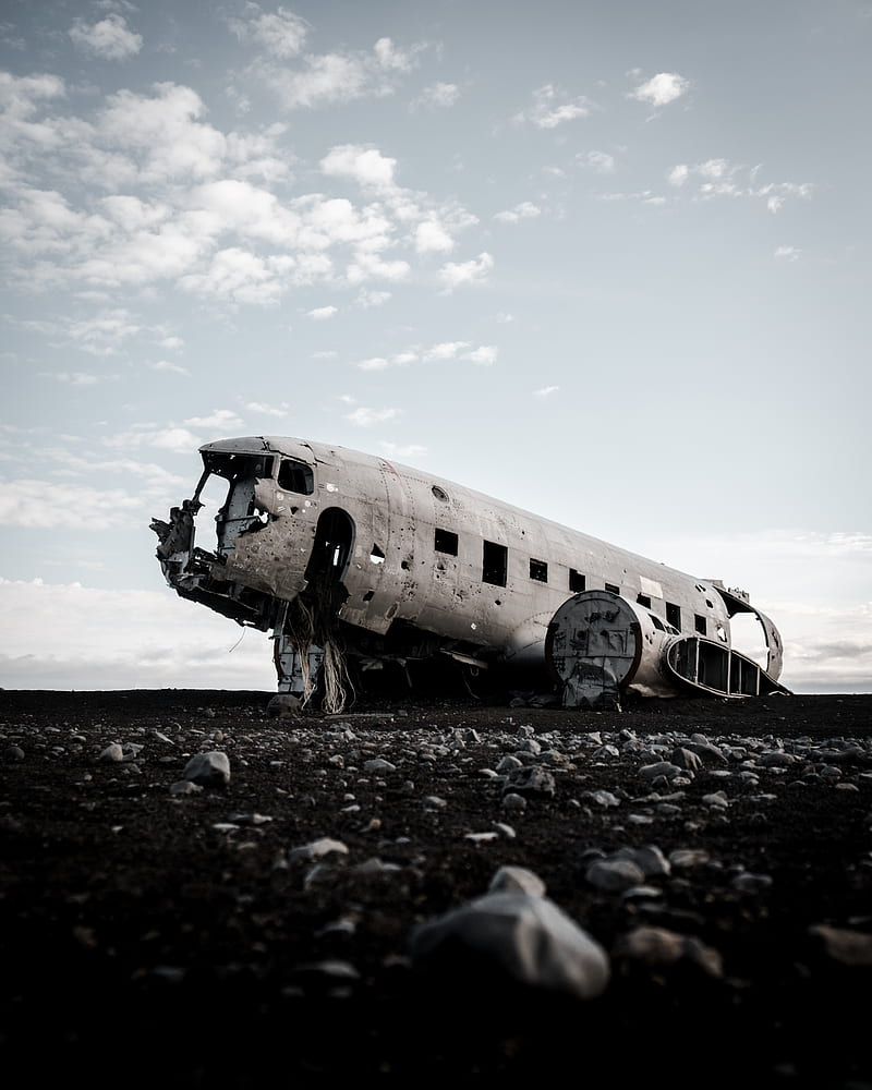 wrecked airplane on gray rocky ground under blue and white sunny cloudy sky during daytime, HD phone wallpaper