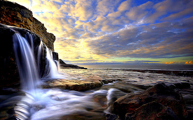 Waterfall, rocks, lovely, view, colors, bonito, sunset, sky, clouds, sea, water, splendor, peaceful, beauty, nature, sunrise, HD wallpaper