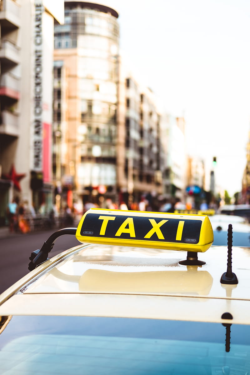 selective focus of yellow taxi LED signage, HD phone wallpaper