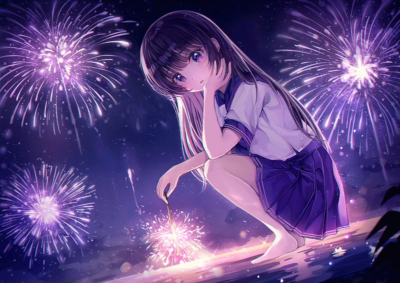fireworks going off in the night sky