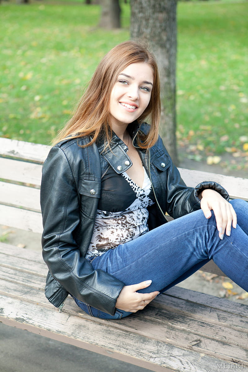Adriana F, model, women outdoors, looking at viewer, leather jackets, bench, sitting, brunette, smiling, long hair, Adriana Morriss, black jackets, MetArt Magazine, happy, pale, open jacket, jacket, on bench, blue jeans, blue pants, HD phone wallpaper
