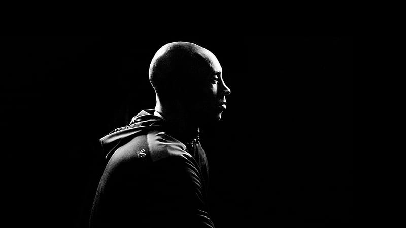 Kobe Bean Bryant Is Sitting And Facing One Side In A Black Background Celebrities, HD wallpaper