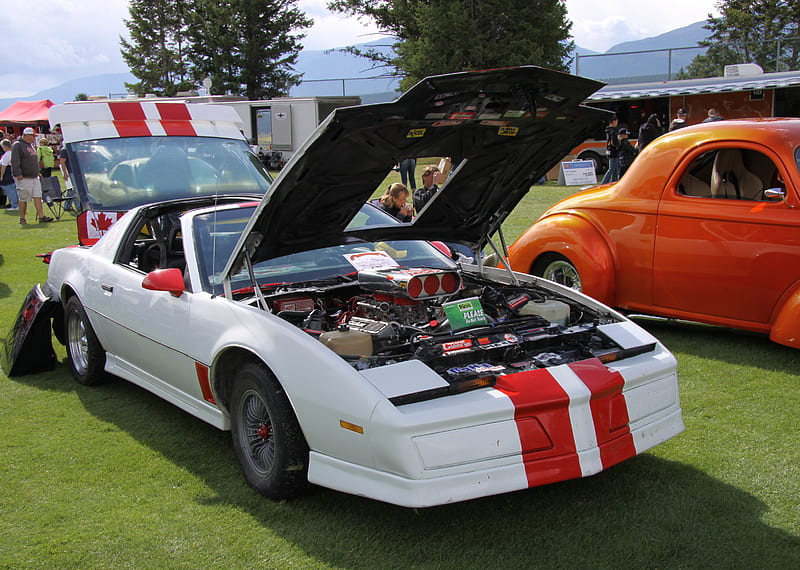 Pontiac 1984 in Radium Hot Springs car show 61, red, orange, tent, GMC