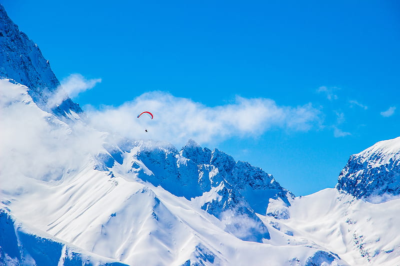 of person with parachute above snowy mountain, HD wallpaper