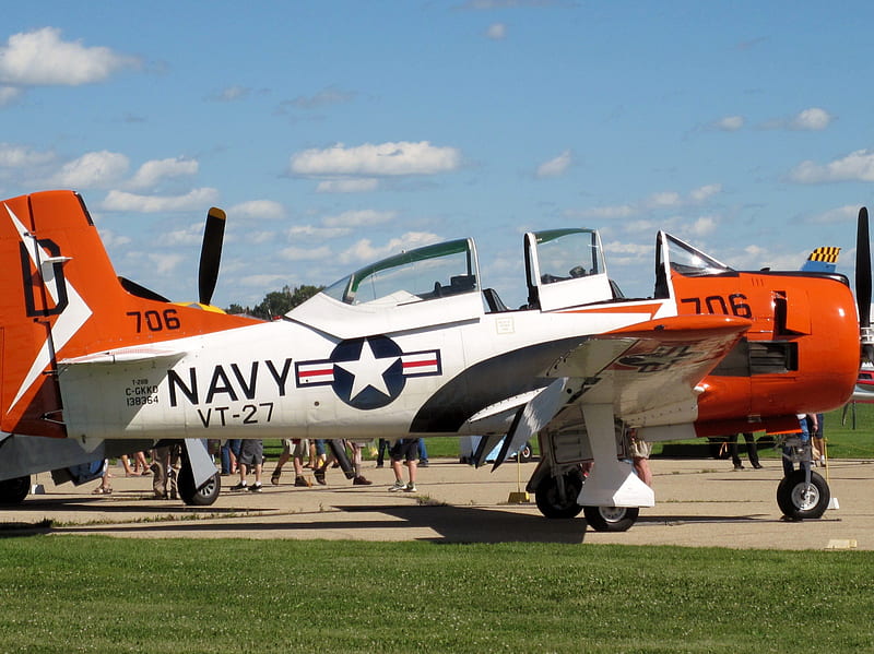 Aircraft VT-27 is a Primary training squadron USA, Military, grass, orange, black, sky, clouds, wheels, aircraft, airplane, green, white, star, blue, HD wallpaper