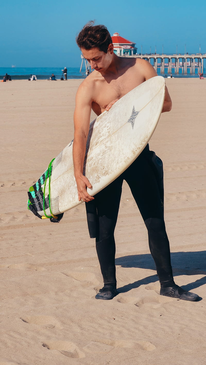 Man in Black Pants Holding White Surfboard, HD phone wallpaper