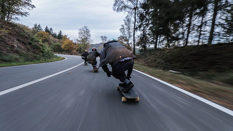 three person riding skateboards downhill during daytime, HD wallpaper