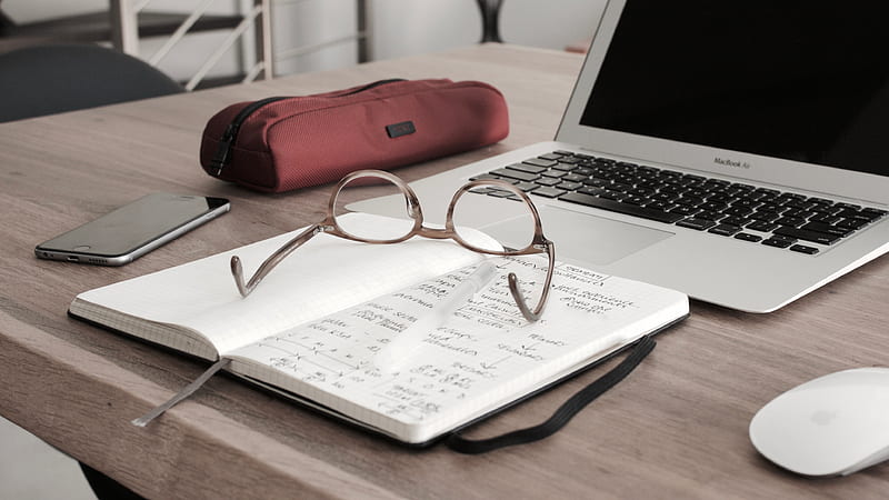 eyeglasses on book beside laptop, HD wallpaper