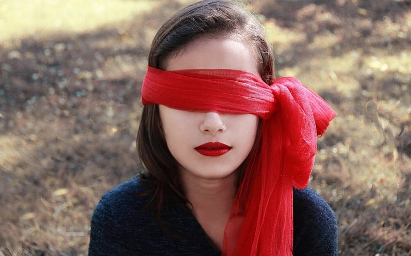 Beautiful blindfolded woman with red lipstick by Mendelex Photography