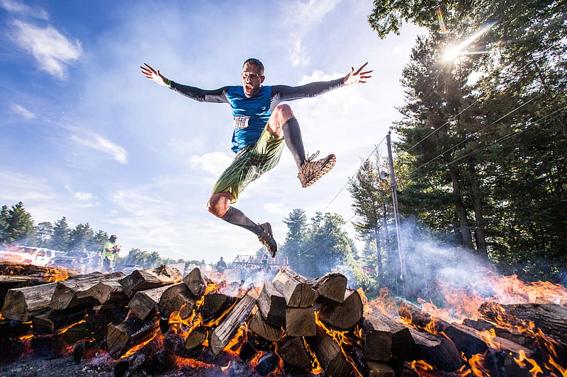 Player Jumping Out Of Burning Woods, esports, jump, running, HD wallpaper