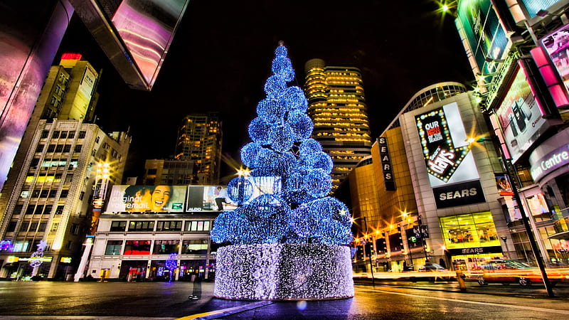 Blue Lightning Christmas Tree In The Middle Of Road Surrounded By Buildings Christmas, HD wallpaper