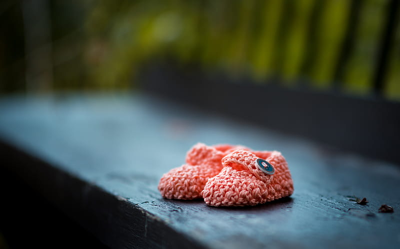 pair of baby's pink knit shoes on bench, HD wallpaper