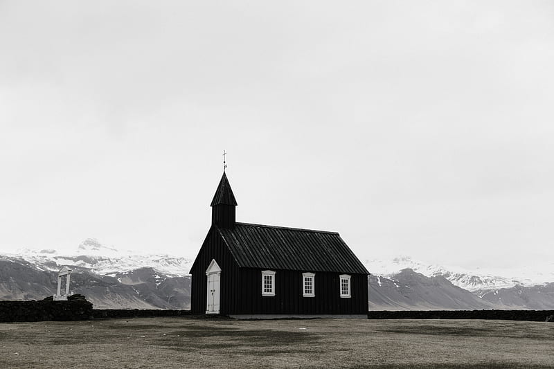 A small chapel in a plain with snowy mountains on the horizon, HD ...