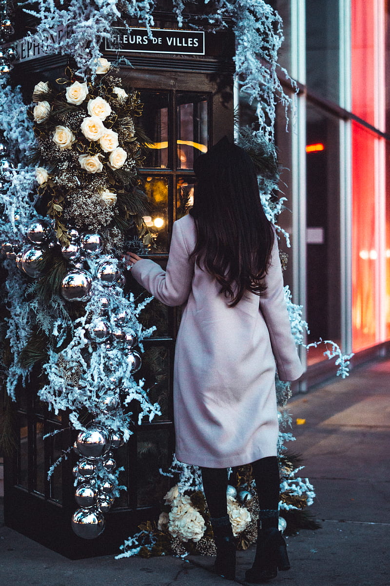 woman in pink coat standing beside christmas tree, HD phone wallpaper