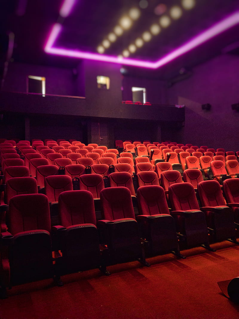 Free Vector  Movie theater with white screen curtains seats