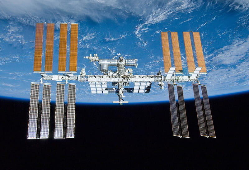 The International Space Station over Earth, cool, space, fun, space station, earth, HD wallpaper
