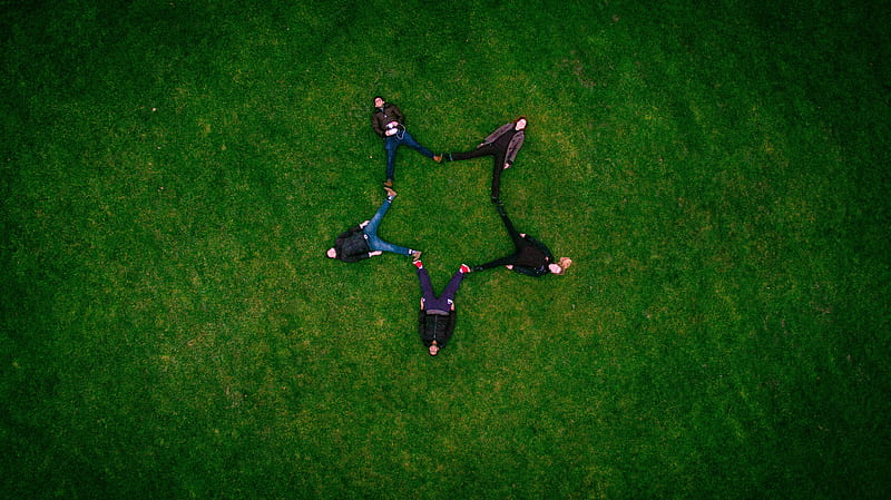 five people laying on grass field making star sign, HD wallpaper