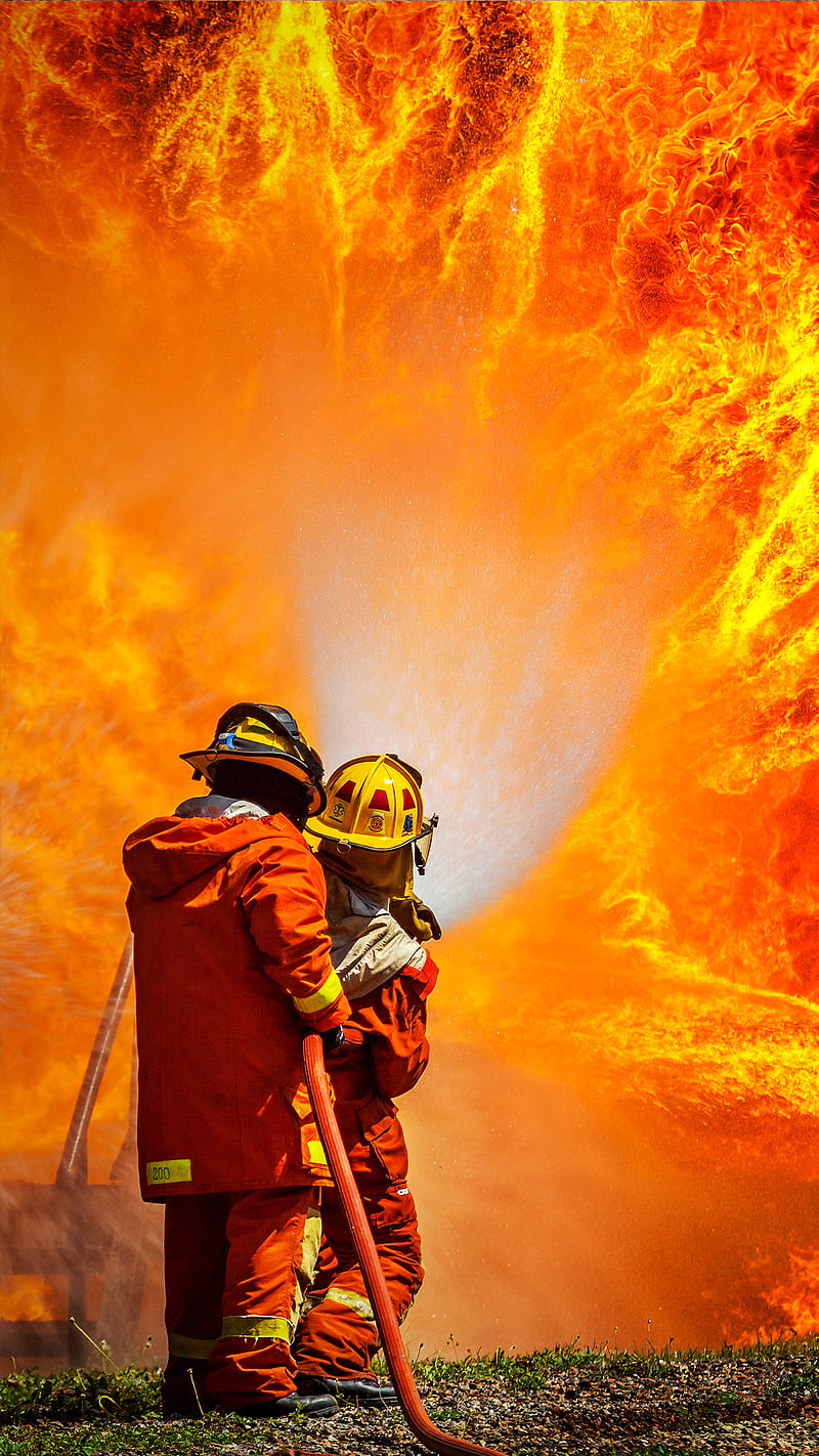 Premium Photo  Firefighter works on fire fireman walks inside burning  building illustration generative ai