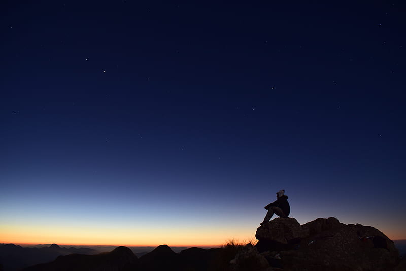 silhouette of person sitting on rock during night time, HD wallpaper