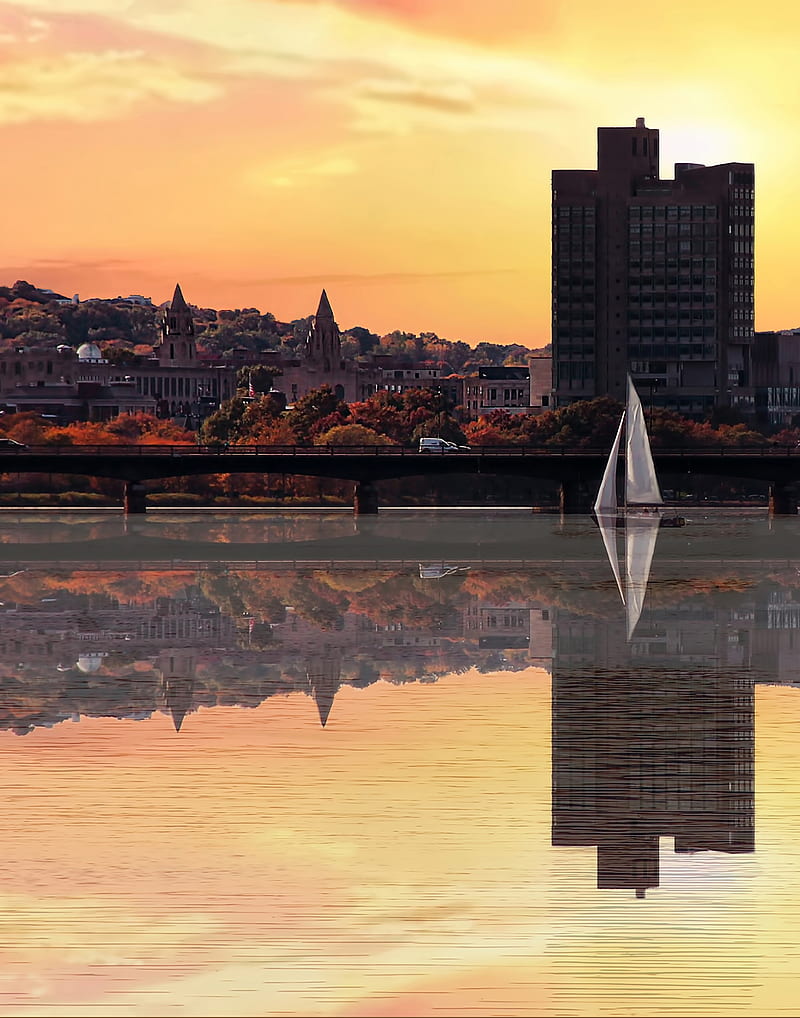 Sailboat on lake, boston, city, lake, reflections, sunset, water, yellow sky, HD phone wallpaper