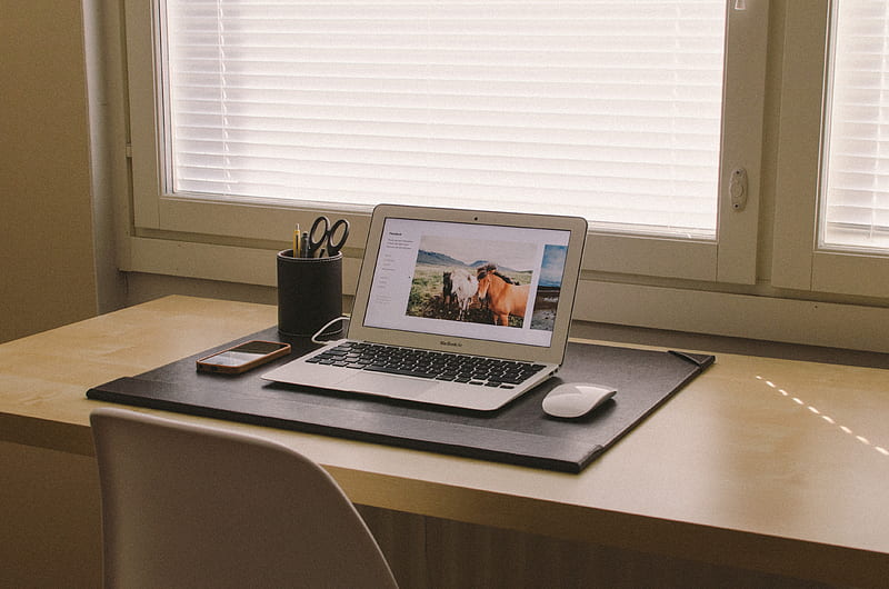 turned on MacBook on beige wooden desk, HD wallpaper