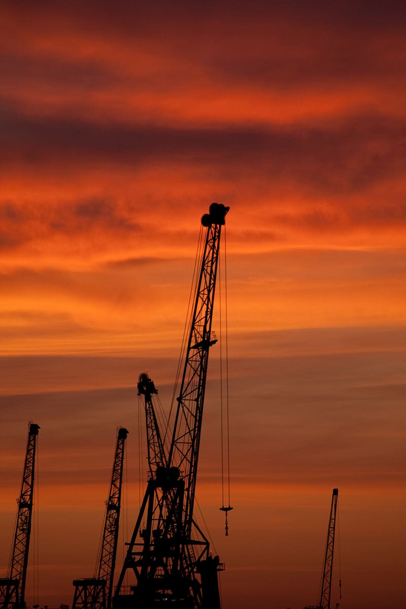 construction cranes, sunset, silhouettes, HD phone wallpaper