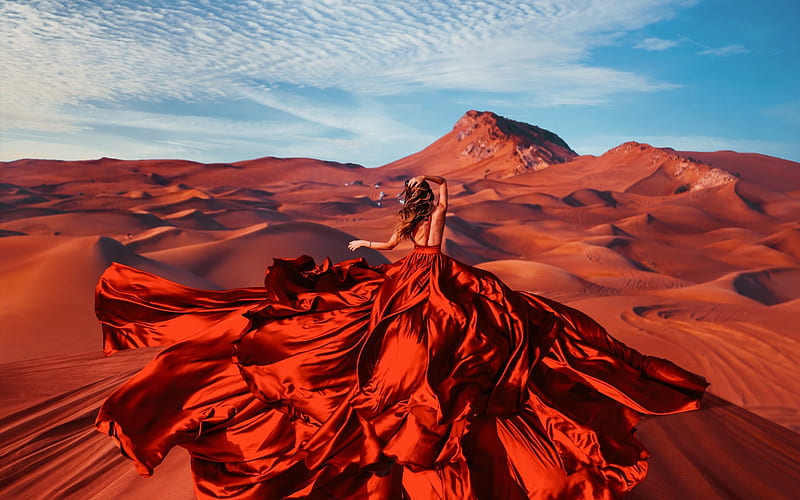 https://w0.peakpx.com/wallpaper/297/946/HD-wallpaper-red-desert-dress-model-girl-wind-woman-blue.jpg