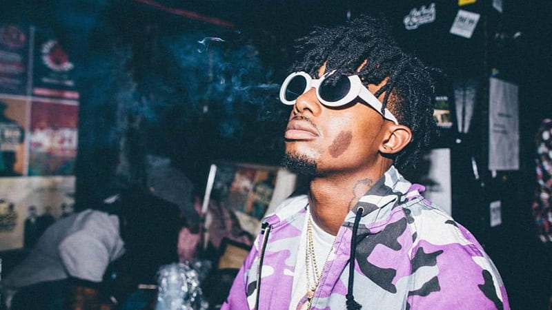 playboi carti is looking up wearing purple and black coat with white tshirt and goggles music, HD wallpaper