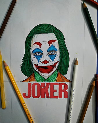 Microrealistic The Joker portrait tattoo done on the