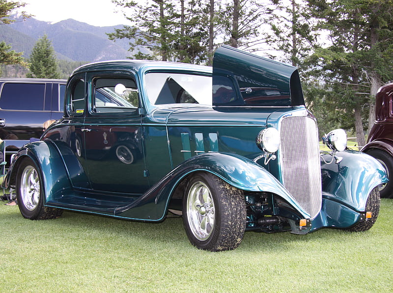 Chevrolet at the Radium Hot Springs car show 114 - Canada , Chevrolet, Chrome, trees, silver, nickel, Grills, green, mountains, Headlights, car, graphy, Tires, blue, HD wallpaper
