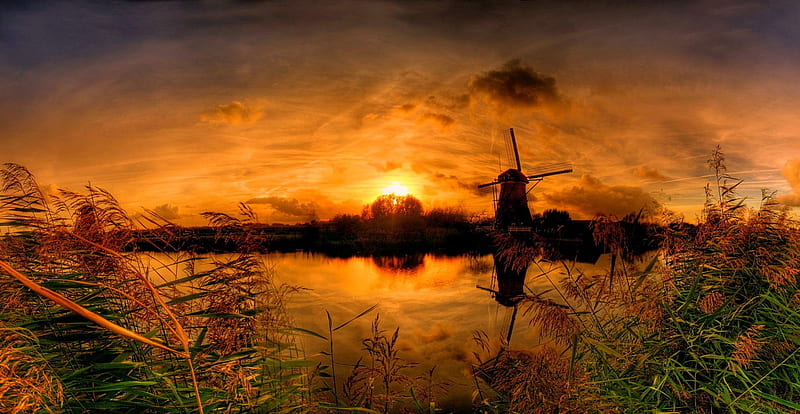 Kinderdijk Mill At Sunset, golden ambient, Netherlands, canal, bonito, sunset, trees, sky, clouds, water, rush, old mill, HD wallpaper