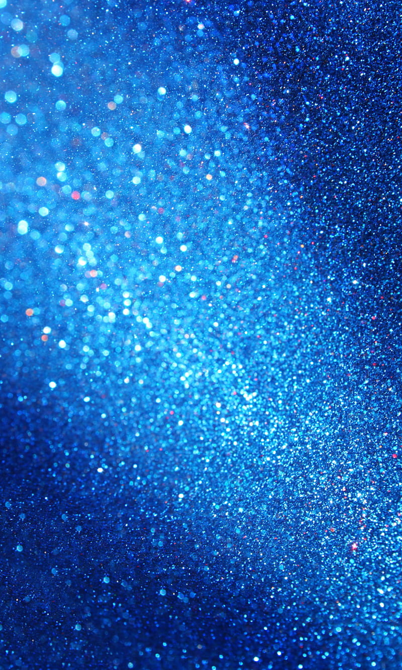 Light baby blue, glitter, sparkle and shine abstract background