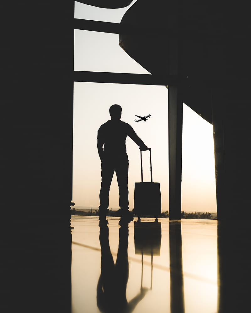 silhouette of man holding luggage inside airport, HD phone wallpaper