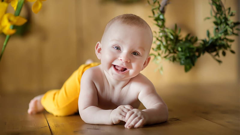 Cute Baby Is Lying Down On Floor With Smiley Face Wearing Yellow Pant Cute, HD wallpaper
